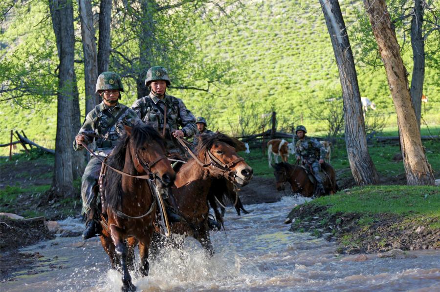 Soldiers patrol border areas on horseback Soldiers patrol border areas on horseback