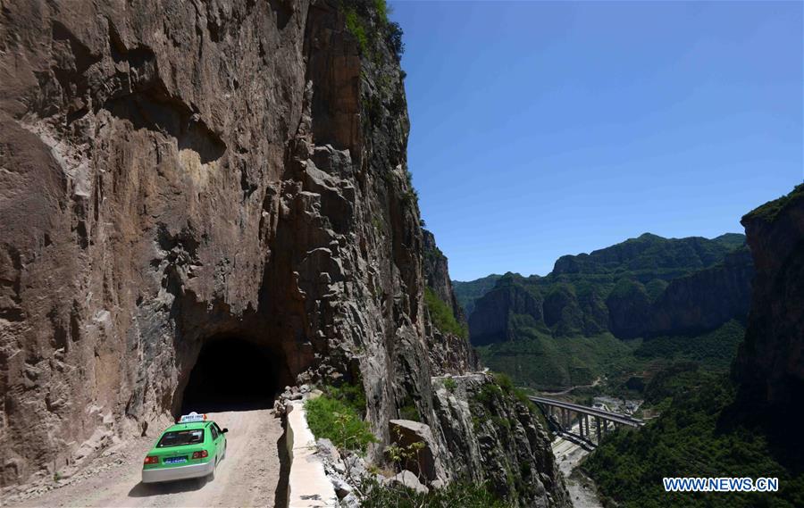 In pics: road on cliffs of Taihang Mountain in N China #CHINA-SHANXI-PINGSHUN COUNTY-ROAD ON CLIFFS (CN)