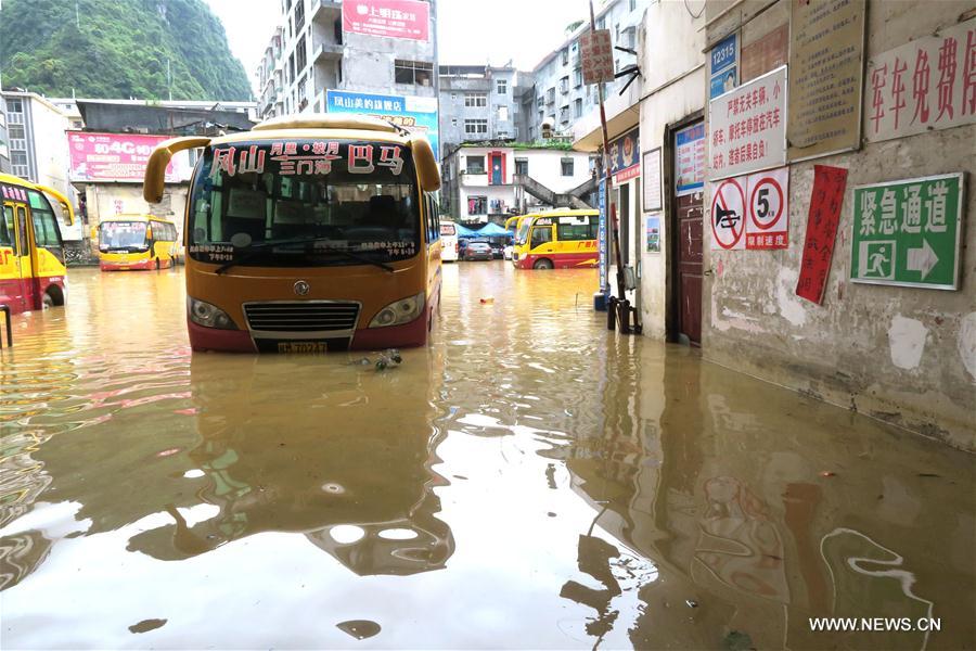 torrential,richter scale torrential rain hits south china"s county, causing flood