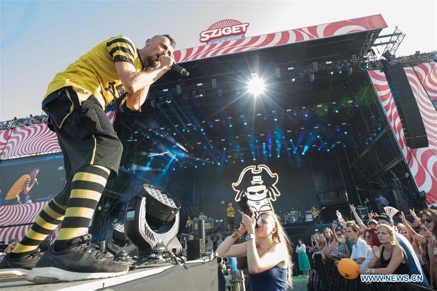 Revellers enjoy performance of band Dubioza Kolektiv during Sziget Festival HUNGARY-BUDAPEST-SZIGET FESTIVAL