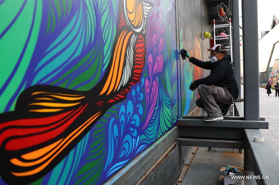 Artists from China and France create graffiti artworks in Beijing CHINA-BEIJING-GRAFFITI (CN)