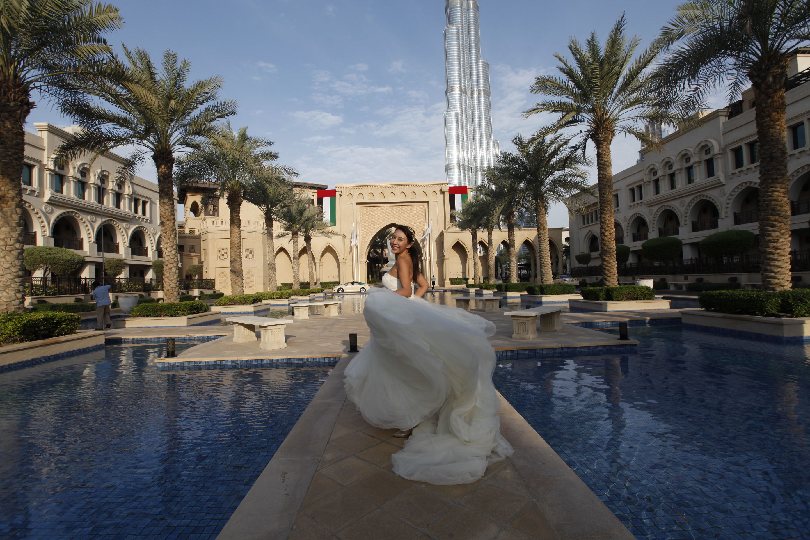 中国婚博会靓丽一景--《ET迪拜》婚拍_经营快讯_光明网