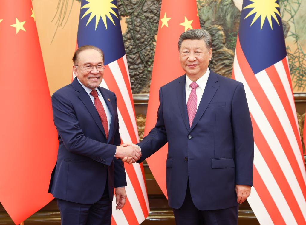Xi meets Malaysian prime minister