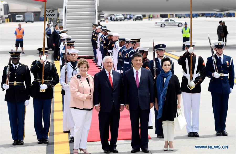 Xi arrives in U.S. for first meeting with Trump