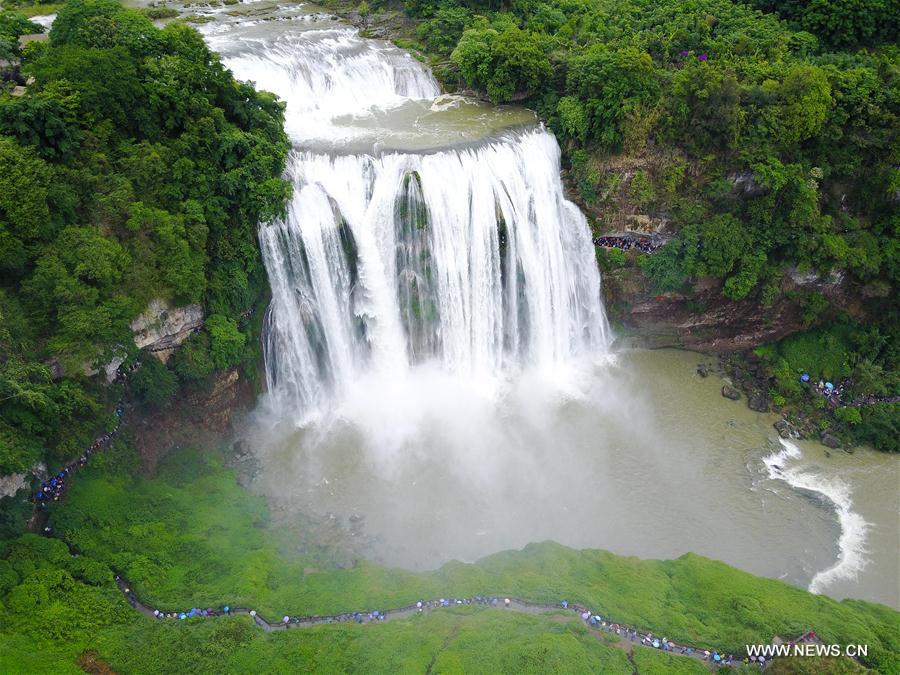 water level of huangguoshu waterfall rises due to heavy rainfall