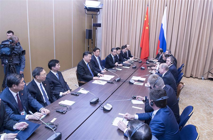 Xi, Putin meet on bilateral ties, SCO development