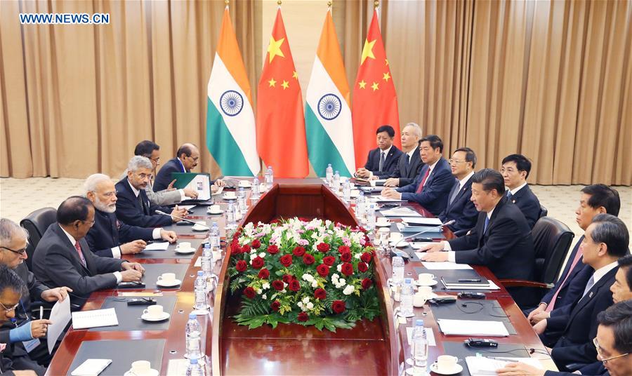 Xi says China, India should focus on cooperation