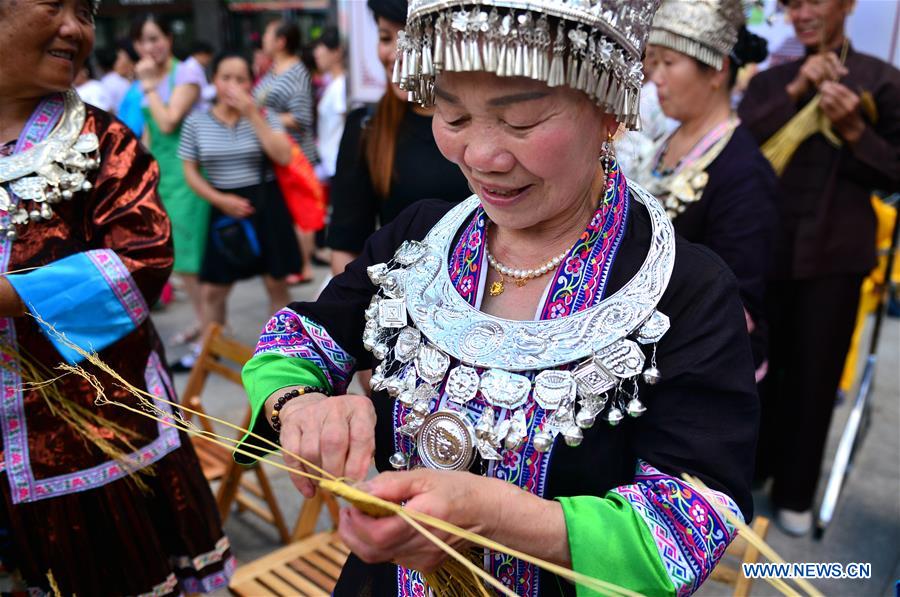 Traditional crafts presented during intangible cultural heritage show in Guangxi