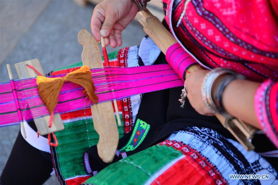 Traditional crafts presented during intangible cultural heritage show in Guangxi