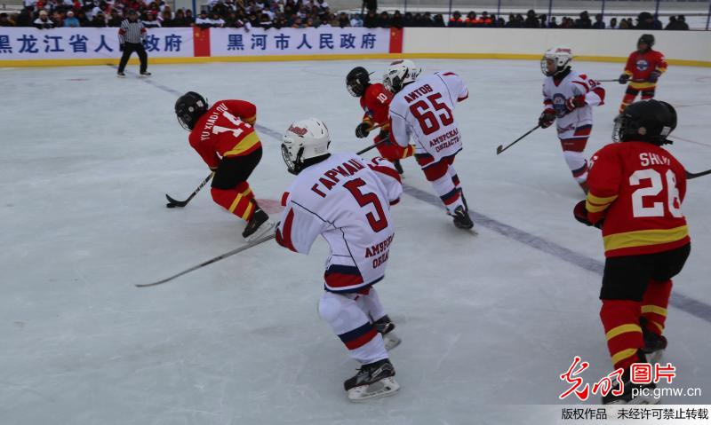 Hockey friendly match between Chinese and Russian young sportsmen held at border river