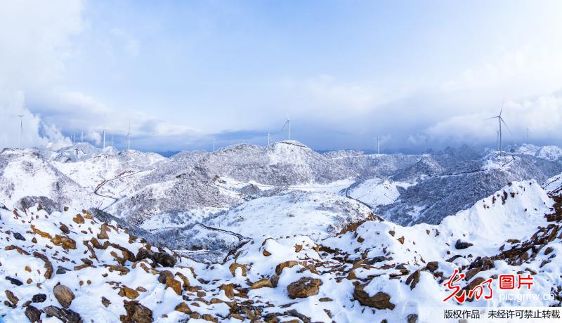 Stunning scenery of snow-covered wind power plant in SW China