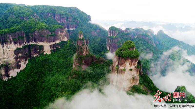 Aerial view of fog-enveloped Xianju National Park in E China’s Zhejiang