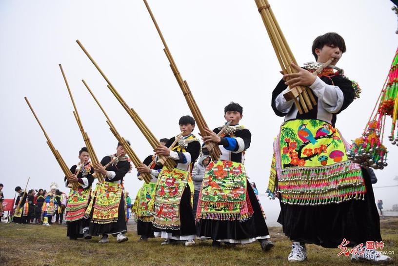 Buyi people dance at traditional folk activity in SW China’s Guizhou