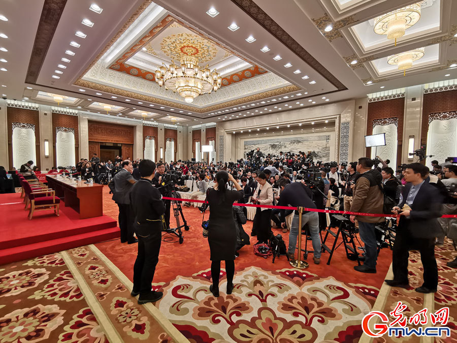Journalists prepare for press conference for 2nd session of the 13th CPPCC National Committee