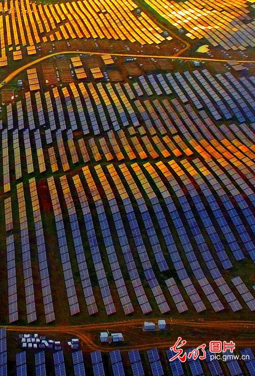Aerial view of solar photovoltaic power station in E China’s Anhui