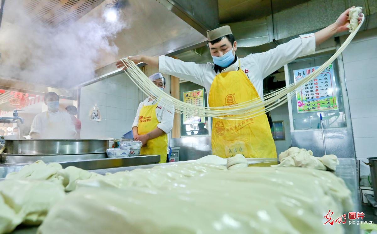 Restaurants gradually back in business under strict prevention measures in Zhangye, NW China's Gansu