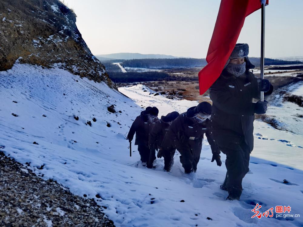 Border guards patrolling along the boundary river of north China's Inner Mongolia