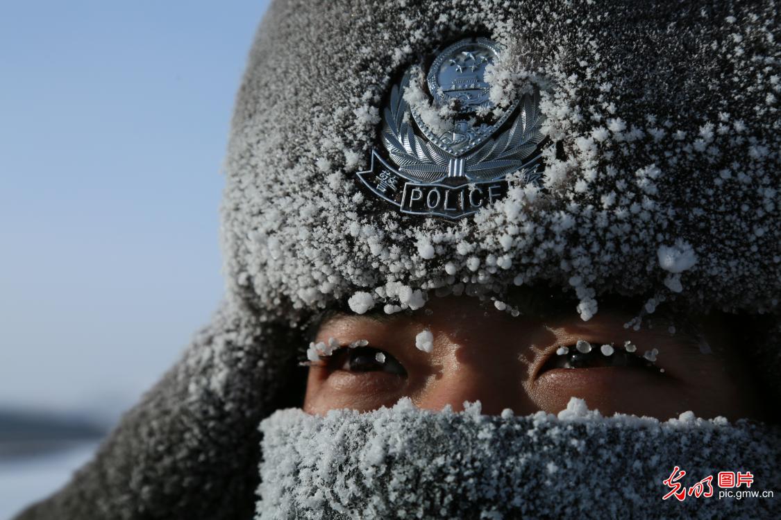 Border guards patrolling along the boundary river of north China's Inner Mongolia