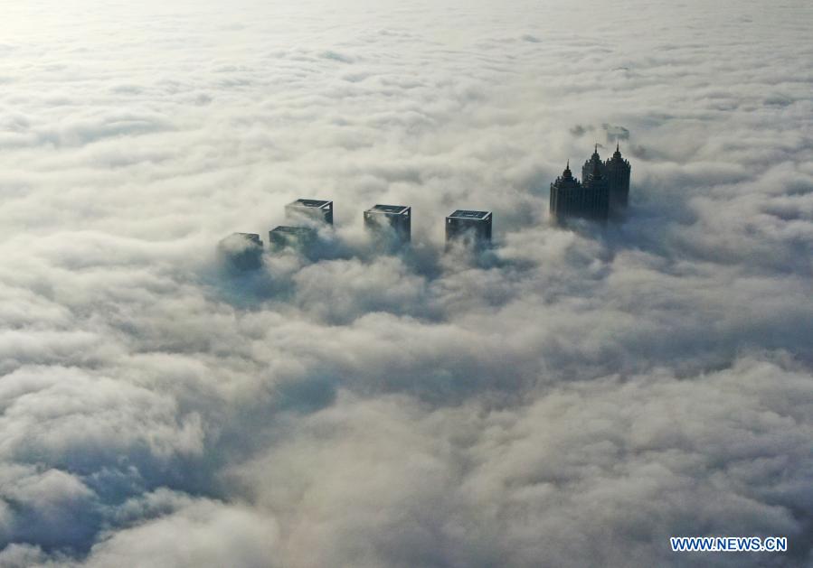 Skyscrapers shrouded in fog in China's Liaoning