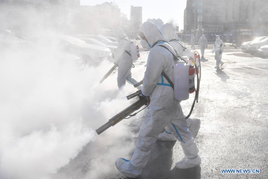 Staff members conduct disinfection in Jilin