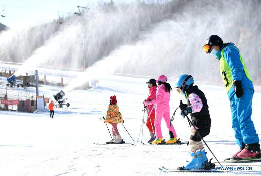 People practice skiing at ski resort in Shijiazhuang, N China