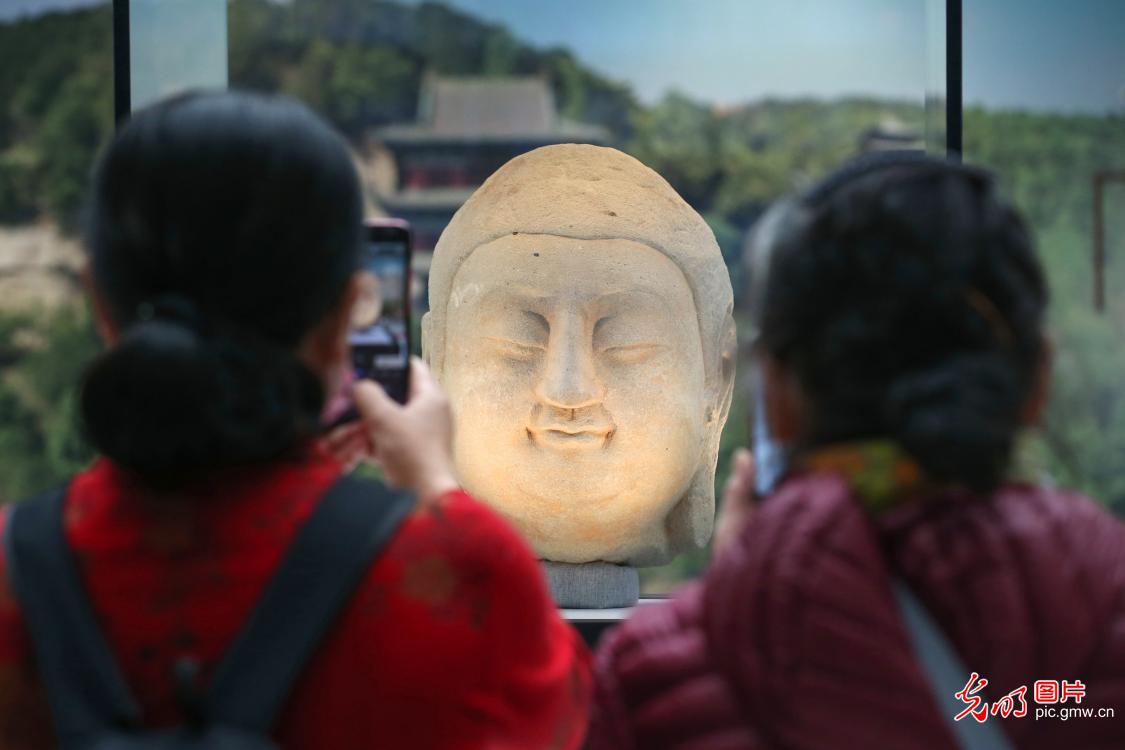 Buddha head from Tianlongshan Grottoes returning home