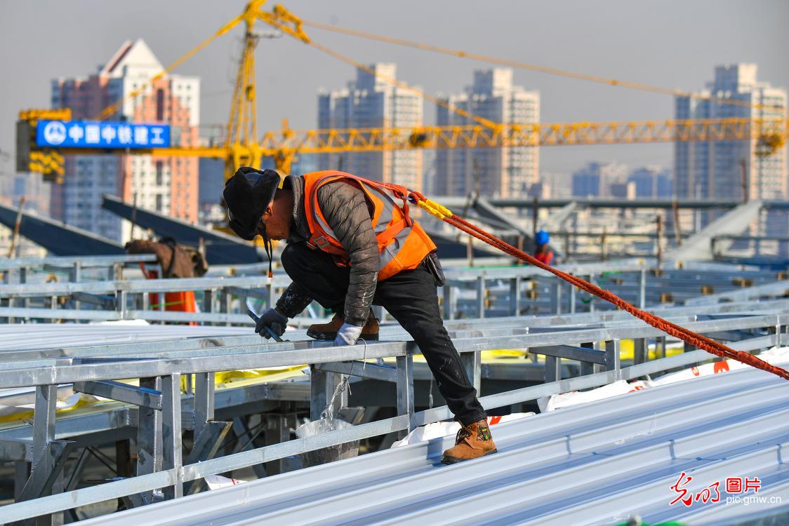 Construction of train station in full swing in Beijing