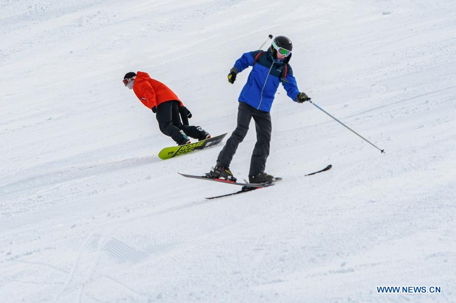 People practice skiing at Mount Hermon ski resort in Golan Heights