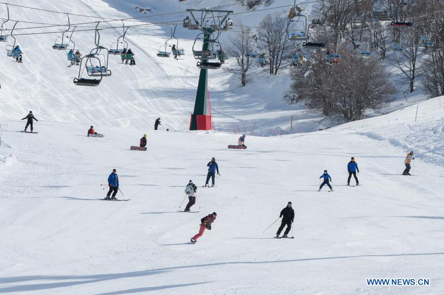 People practice skiing at Mount Hermon ski resort in Golan Heights