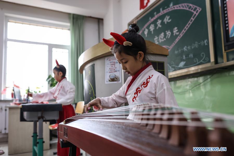 Students return to school for new semester in China