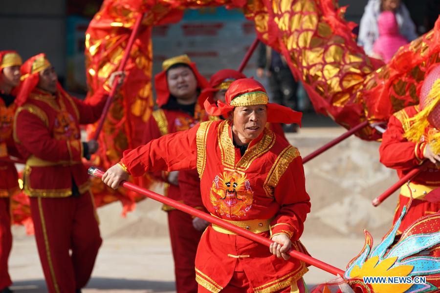 Villagers rehearse dragon and lion dance in Andi Village, Shanxi