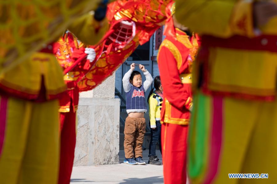 Villagers rehearse dragon and lion dance in Andi Village, Shanxi