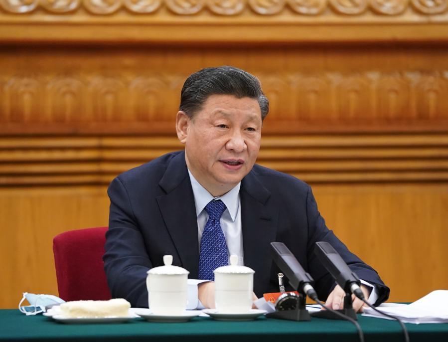 Xi stresses high-quality development, improving people's well-being