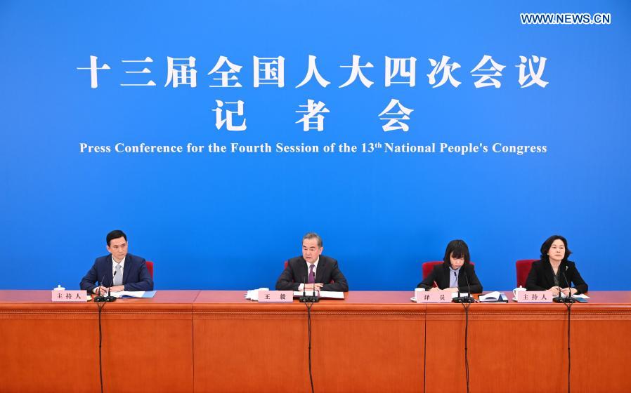 Chinese FM meets press on foreign policy, relations