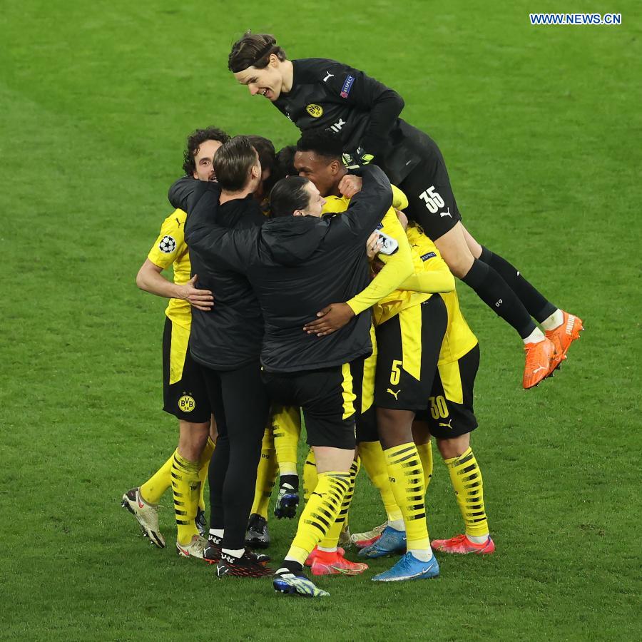 Dortmund plays out stalemate with Sevilla to clinch Champions League quarterfinals