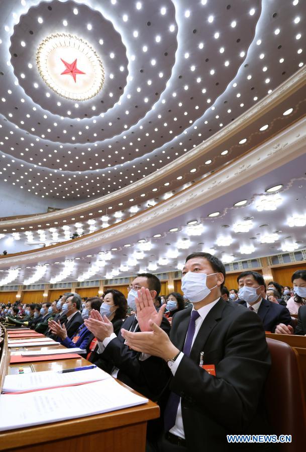 China's top legislature holds closing meeting of annual session