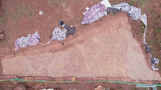 Newly-found dinosaur footprints seen at excavation site in SE China