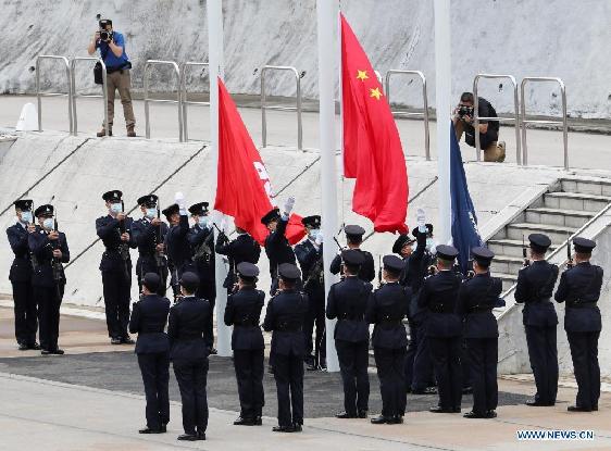 Hong Kong police march in Chinese-style goose-stepping on National Security Education Day