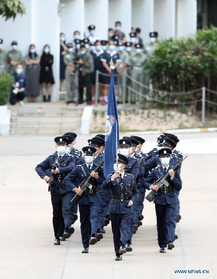 Hong Kong police march in Chinese-style goose-stepping on National Security Education Day