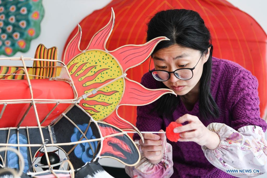 Kite-making master in Weifang City of east China's Shandong