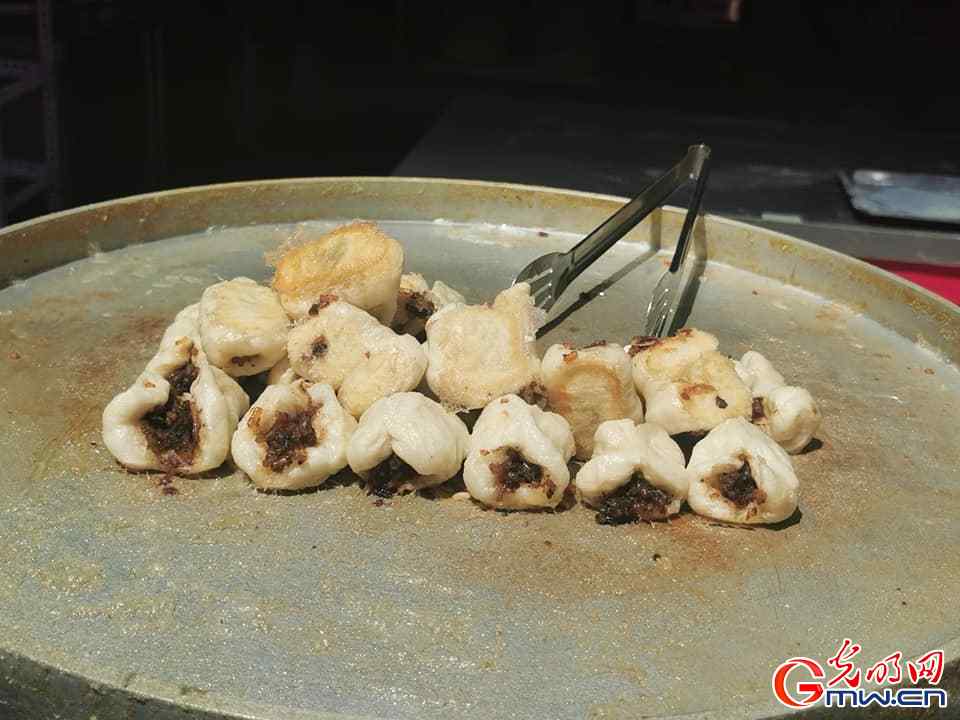 Too much to eat and enjoy at Kuanzhai Alley Food Street in Urumqi of Xinjiang