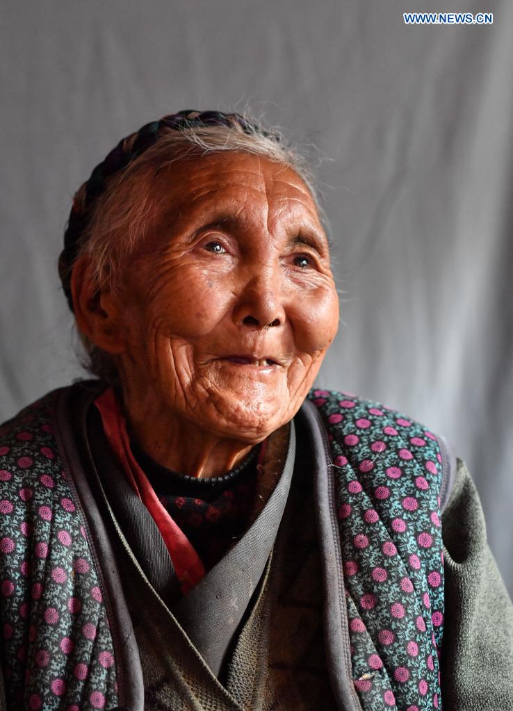 Pic story of former serf Tsering Yangzom's new life in Tibet