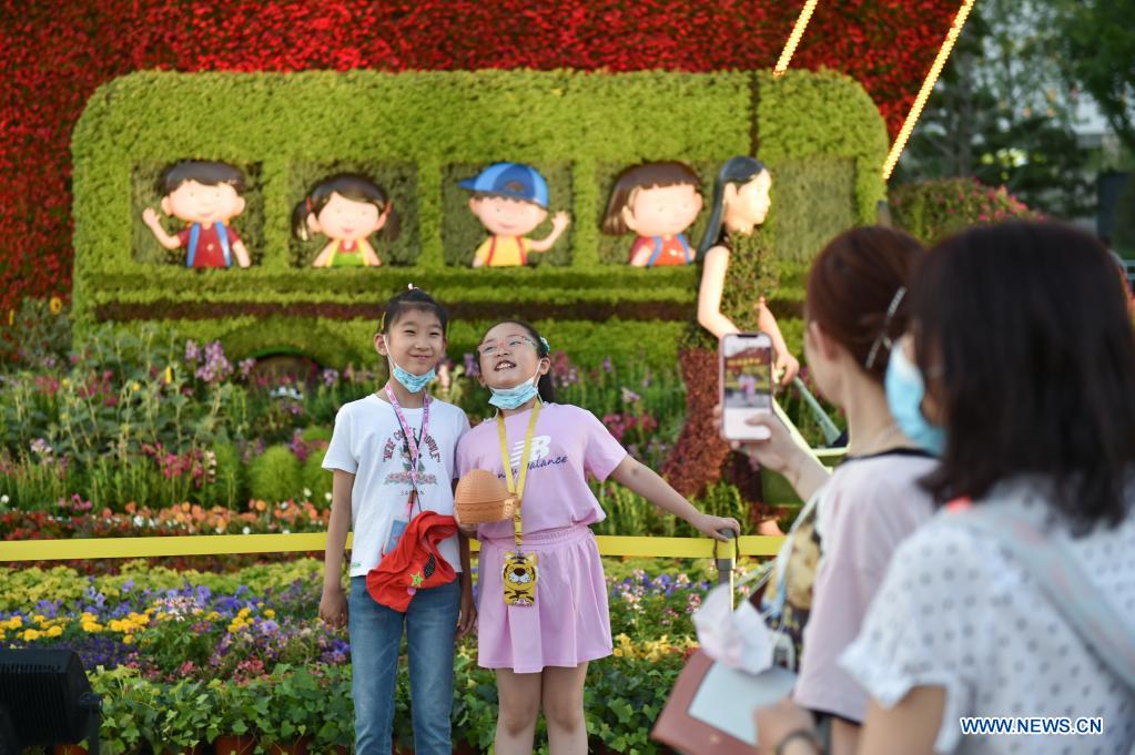 Flower decorations set up along Chang'an Avenue in Beijing