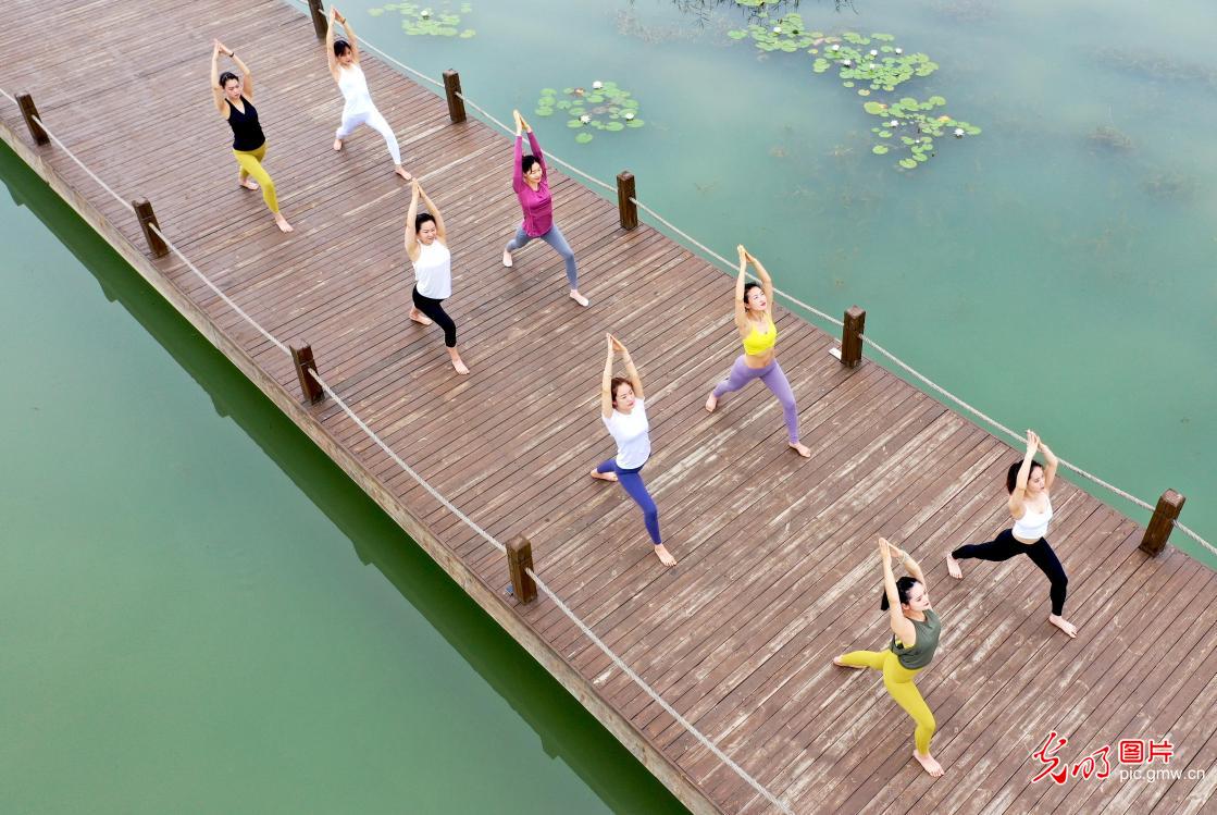 People celebrates International Yoga Day in China