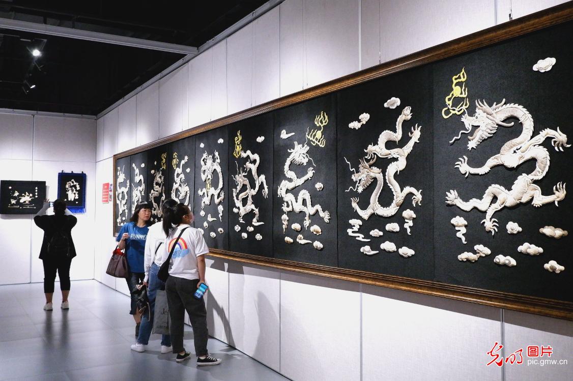 Hezhe Fish Skin Painting Art Exhibition held in N China's Heilongjiang