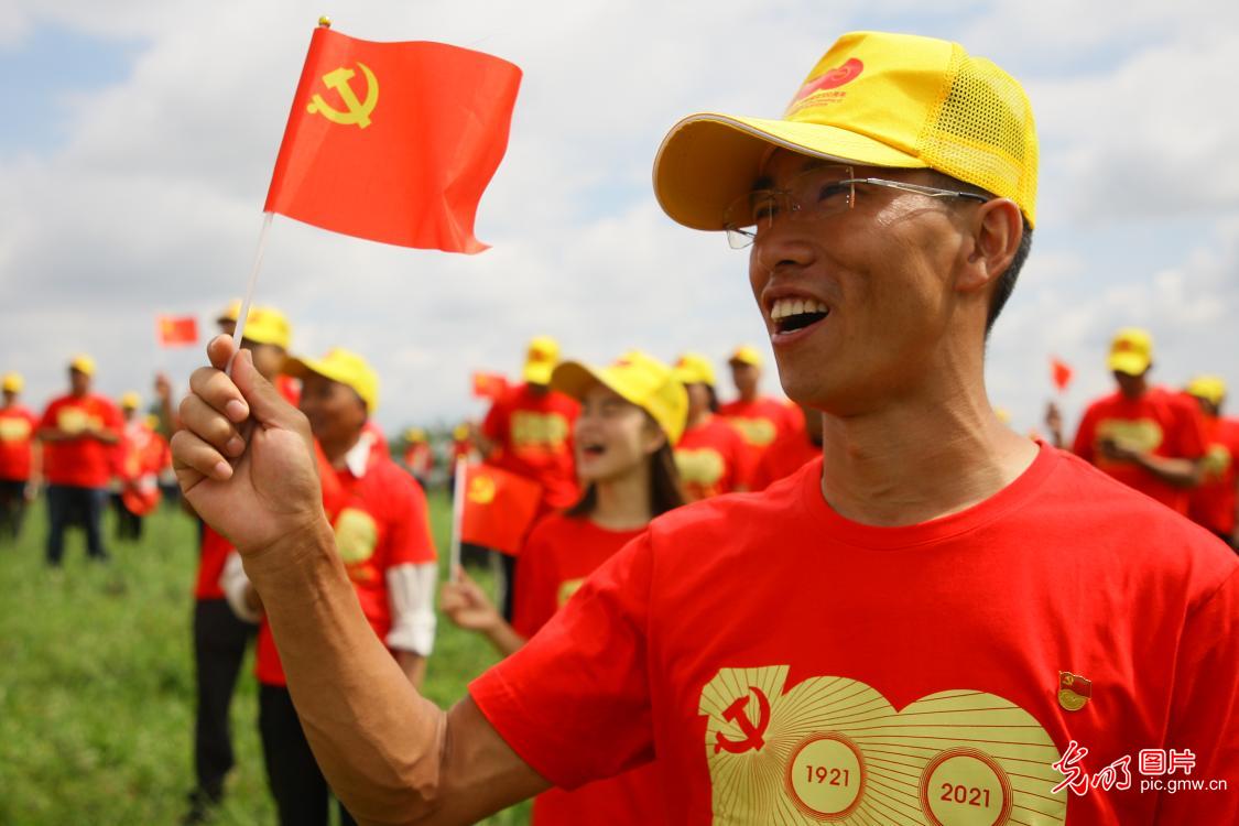 In pics: Chinese people singing red songs in celebration of CPC 100