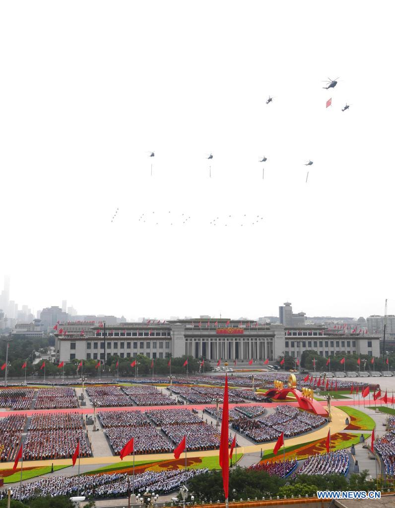 Military aircraft fly over Tian'anmen Square in echelons to mark CPC centenary