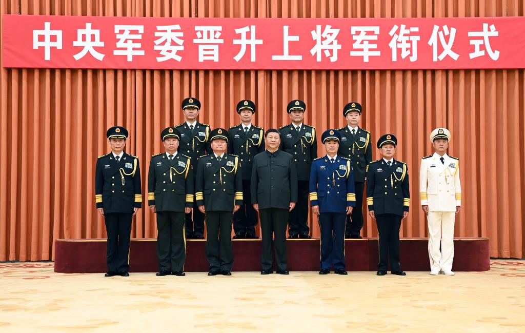 Xi promotes four military officers to rank of general