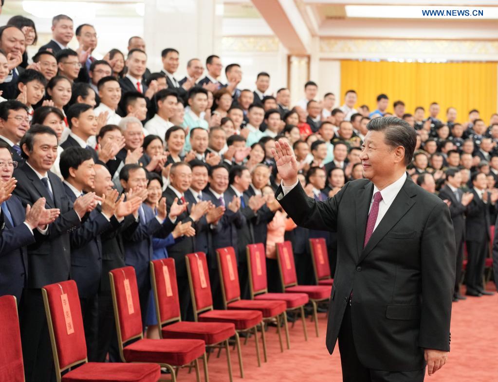 Xi greets people participating in CPC centenary celebration preparations