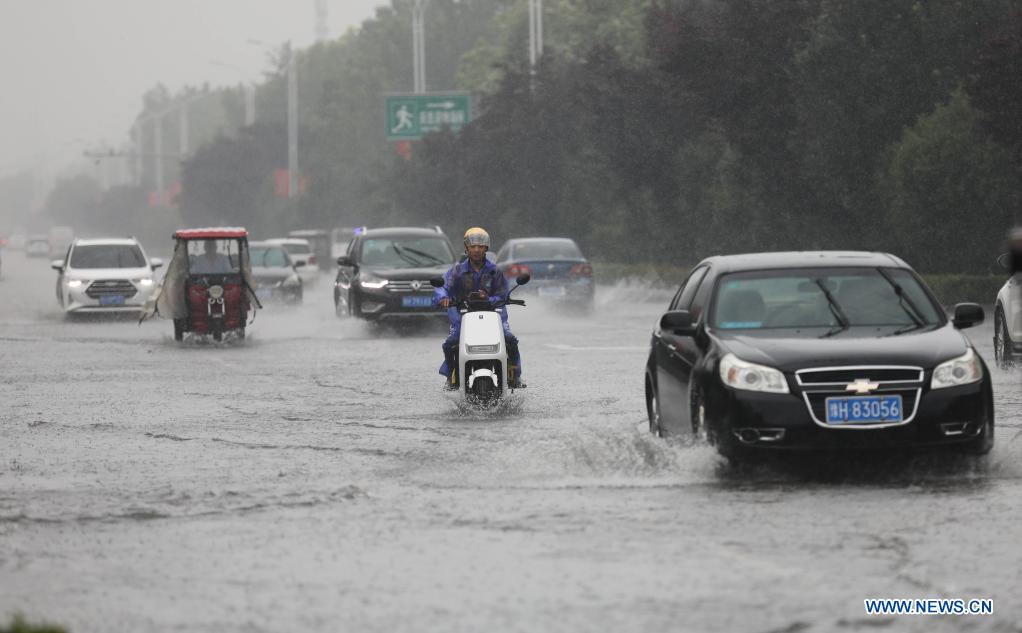 Record rains hit Henan, C China